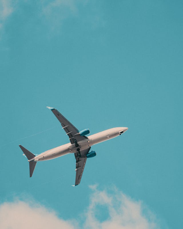 Airplane Photo by Roman Ska: https://www.pexels.com/photo/low-angle-shot-of-a-passenger-plane-13847081/